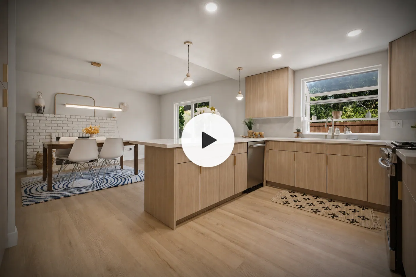 Interactive 3D home tour of a staged kitchen and dining area